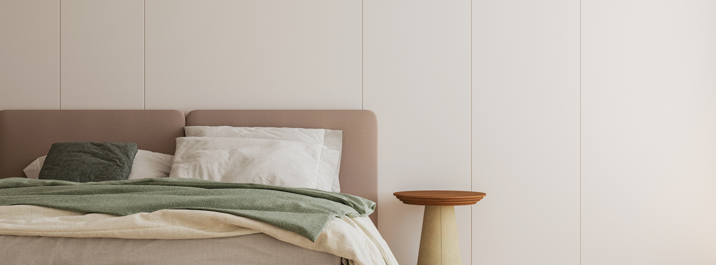 Minimalist bedroom with wooden bed frame and soft linens
